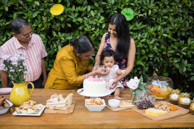 family at first birthday party