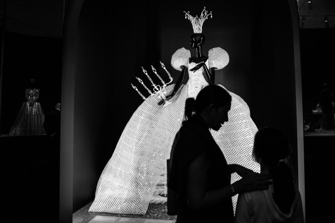 white glowing dress with woman silhouette