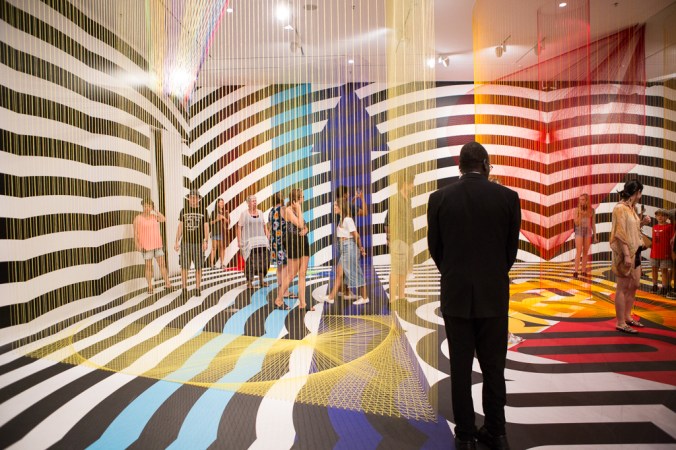 colourful art room with security guard