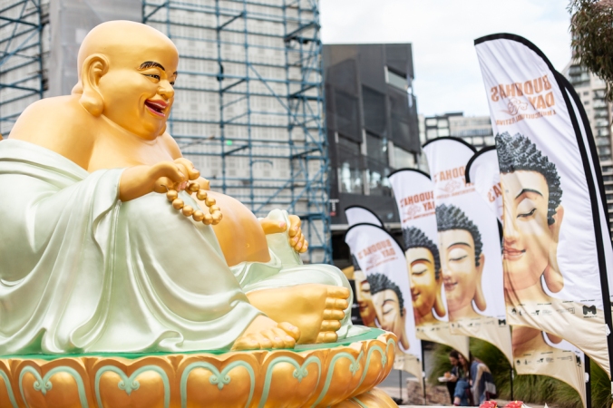 buddha statue and sign at federation square
